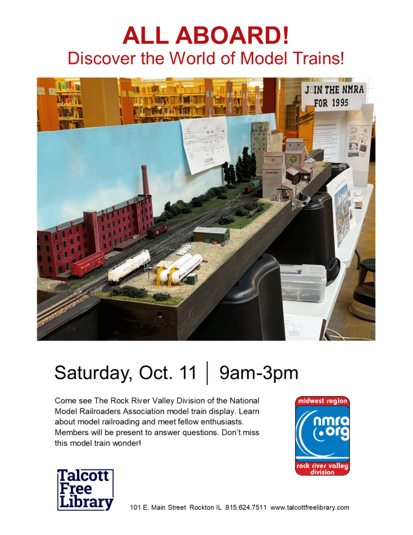 An image of a model train display in a library. Text copied in background.